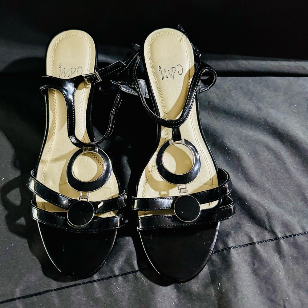Impo Black Patent T-Strap Sandals with Ring Accents